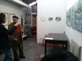 Enrique & John Olsen admiring Ric Abel's paintings. (Christopher de Rouw Photography)