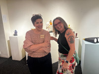 Violet Cooper came to Sydney for her opening drinks - here with a friend from Sydney.