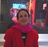 Patricia Anderson admiring Andrew Quilty's exhibition 2011.